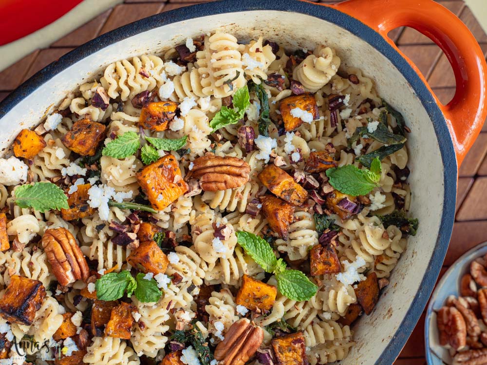 one pot pasta and butternut squash with ricotta sauce and walnuts and mint on top